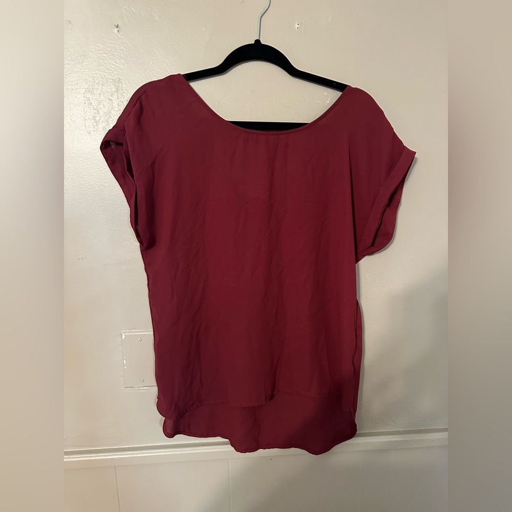 Red pink rose blouse. Cutout on back shoulders. Size large.